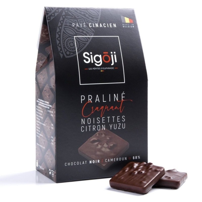 Crunchy praline with yuzu lemon hazelnuts, dark chocolate